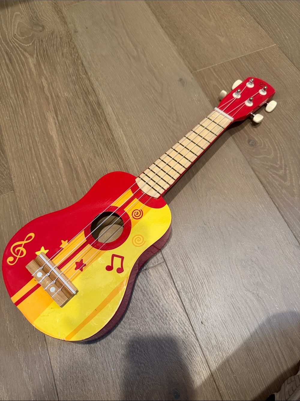 Kids' Red & Yellow Toy Ukulele/ Guitar - Musical Fun